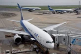 Man 'tries to open emergency exit' mid-air on passenger jet full of holidaymakers