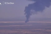 Massive smoke plume rises over Edwards Air Force Base after bomber aircraft crashes