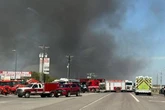Two dead in plane crash fireball after jet smashes into several lorries on motorway