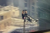 Masked couple scale Empire State Building for wedding proposal as pair taken into custody