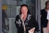 Benefits cheat mum lights cigarette after splurging £120k on 'one too many takeaways'