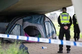 Tent under motorway sealed off and man arrested after 18-year-old allegedly raped