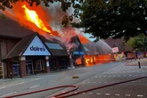 Two boys, 13, in custody as fire rips through UK shopping centre with M&S destroyed