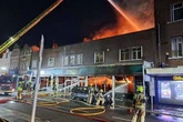 Huge fire rips through Poundland shop as 100 firefighters rush to tackle blaze