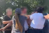 Massive McDonald's carpark brawl erupts as staff members hurl blows at customers