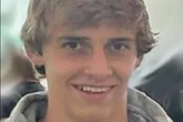 Student, 19, dies after being shot in head 'by suspect who fired gun through floor'