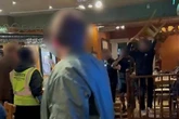 Rowdy Wetherspoons drinkers chuck glasses and chairs in Wild West style brawl