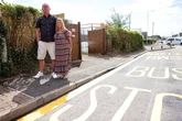 Couple fume as bus stop is built at end of their driveway without warning