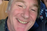 Football fan collapses and dies during match as ambulance firm denies 'chaos'