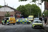 Three gunshots heard as man 'chased into cafe' before armed cops swoop