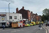 Police swarm Manchester restaurant as 'several diners taken ill after eating food'