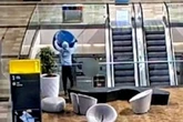 Teen hurls 15kg chair from shopping centre balcony and 'almost killed someone'