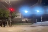 Disturbing video shows cops shoot woman 'point-blank' with 'less lethal' bullet while walking home in LA