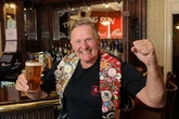 Pint-mad Brit hits 24,000th boozer on world's longest pub crawl and wife is 'OK with it'