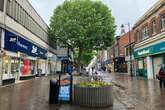 Barber mauled by 'XL Bully' in busy town centre as police make arrest