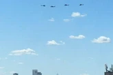 Mystery as 4 helicopters spotted circling London landmarks as thousands watch