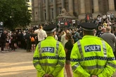 Ironman UK triathlon drama as police chase down suspect who ran onto course