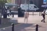 Man casually strolls through town centre completely naked before doing rude act