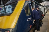 Couple caught in 'sex act' on busy train as police launch appeal for woman in fur coat