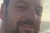 Cop sacked for farting in co-worker's face reveals 'I never actually broke wind'