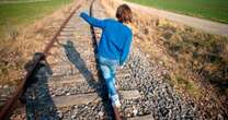 Urgent police warning after children caught 'playing chicken' on railway nearly struck by train