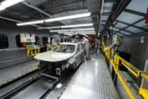 Jaguar Land Rover staff told to stay away from work until at least Tuesday