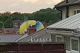 Moment hot air balloon misses target and lands in housing estate