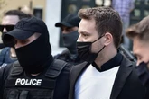 Caroline Crouch's Greek husband arrives at court as crowds chant 'rot in hell'