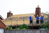Builders spell out support for England at Euro 2020 on roof they're tiling