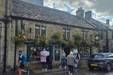 The quaint village with cosy 'pudding parlours', riverside walks and a Christmas 'must-visit'