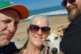 Couple drives 5,000 miles to bring home pup with 'wonky' legs