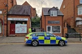 Woman, 38, arrested on suspicion of murder after pensioner found dead inside flat