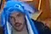 Man in novelty Lilo & Stitch hat hunted by police after violent street robbery