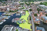 Residents fear tourists will plunge into canal that looks like 'grass'