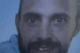 Wanted man who has his own name tattooed on his arm 'believed to be in Midlands'