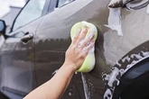 Drivers banned from washing cars as four water firms in England declare hosepipe ban