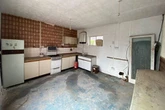 Two-bed derelict seaside cottage up for auction at £1