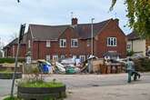 Huge pile of rubbish towers on Midland driveway as neighbours' lives made 'misery'