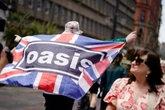 Price of a pint at first Oasis gig in 16 years as fans say it is 'scandalous'