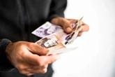 UK households rush to hoard cash over change not seen for two years