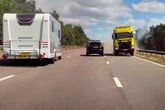 Moment lorry smashes through central reservation and speeds wrong way down M5