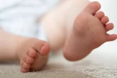 British baby dead with UK households urged to come forward for vaccine