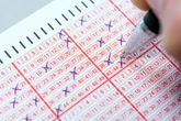 Lotto set to 'finally' pay prize but half of jackpot will disappear