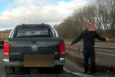 Moment raging driver slams on brakes and stops on M40 during stand-off