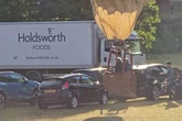 Moment hot air balloon crashes at Midland country fair