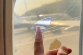 Ryanair passenger 'scared' after sitting down next to 'cracked window'