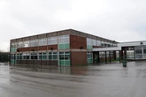 School launches investigation into claims of racial slur against resident