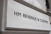 HMRC makes 14 arrests after raids on households and issues warning
