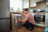 UK households with washing machine in kitchen risk £59 charge