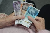 HMRC set to withdraw money 'straight from paypackets' with 300,000 at risk